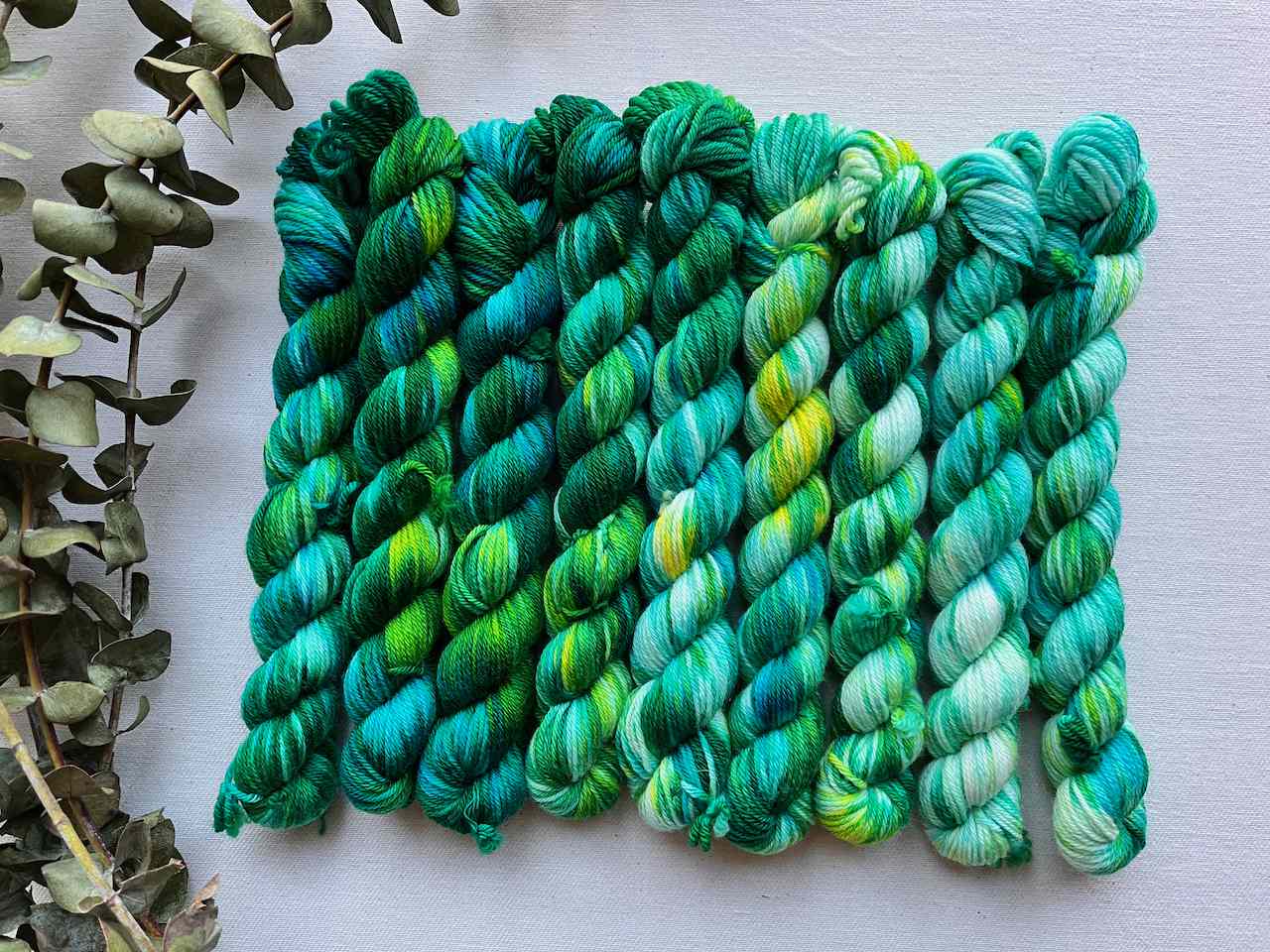 Green and blue merino hand dyed mini skeins.