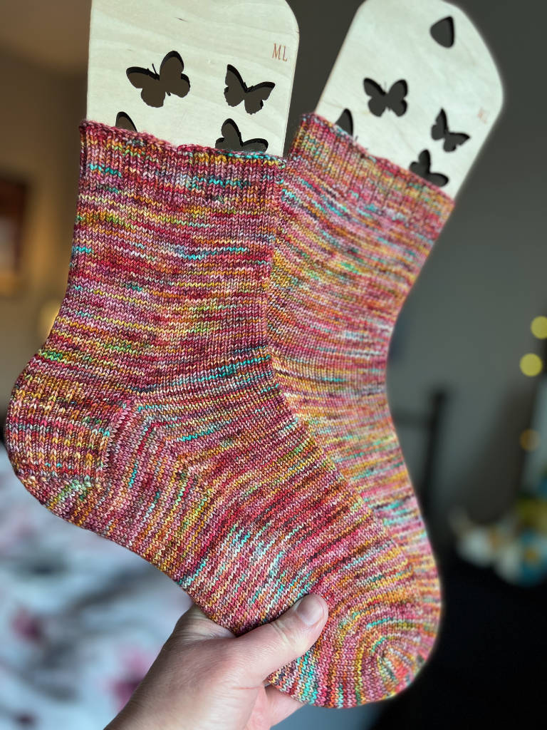 Hand dyed yarn knit with vanilla sock pattern.