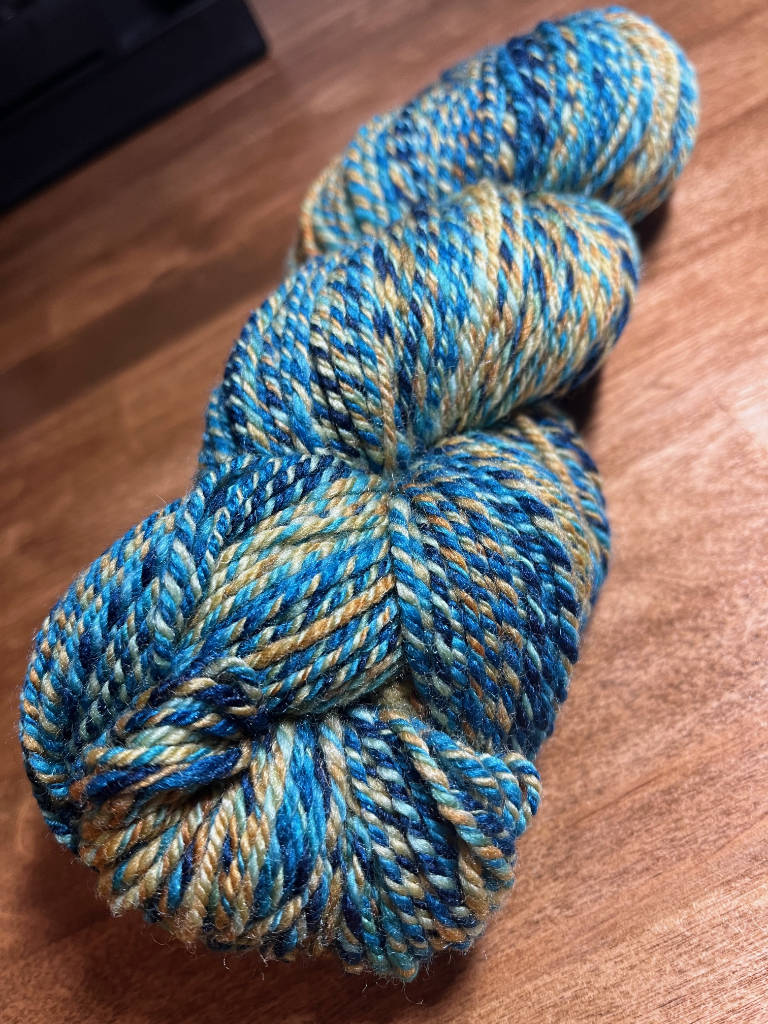 Silk and polworth blend three ply hand spun yarn.