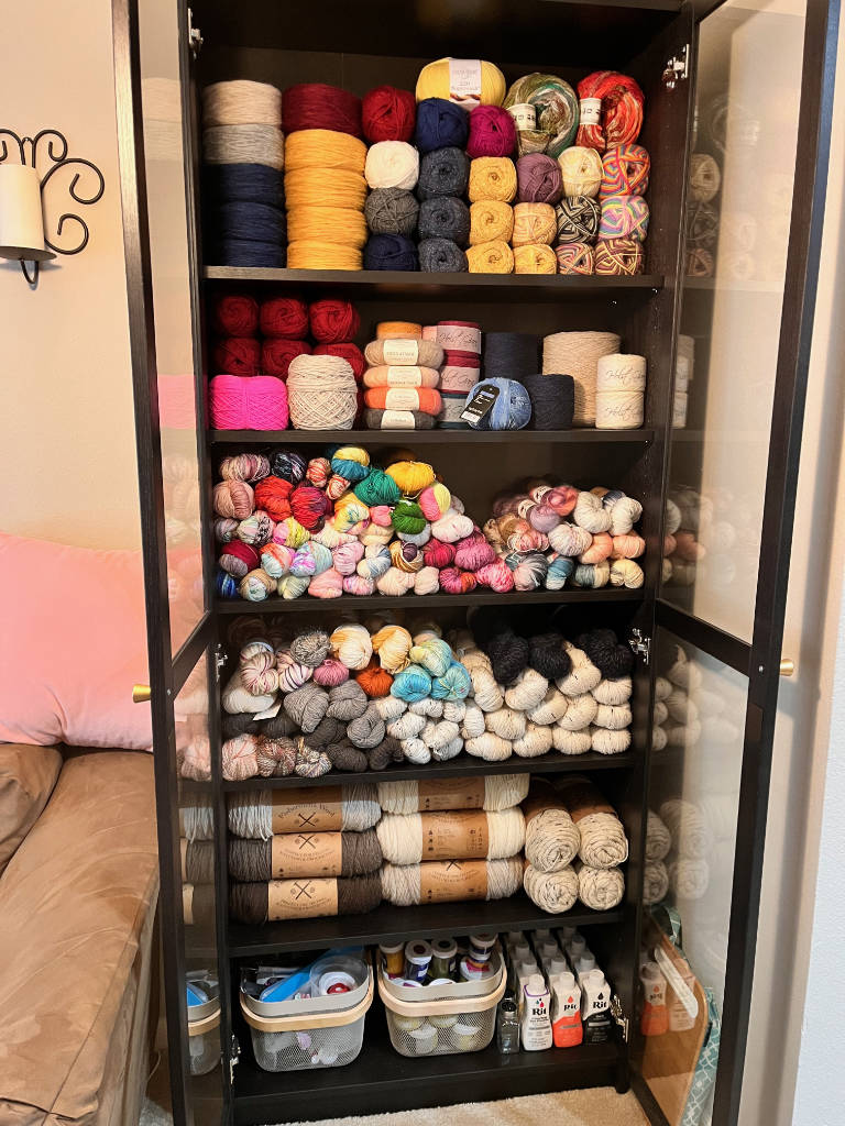 Cabinet full of yarn.